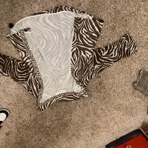 Leopard and zebra print cover-up brand: Alfred dunner I am not sure of size.